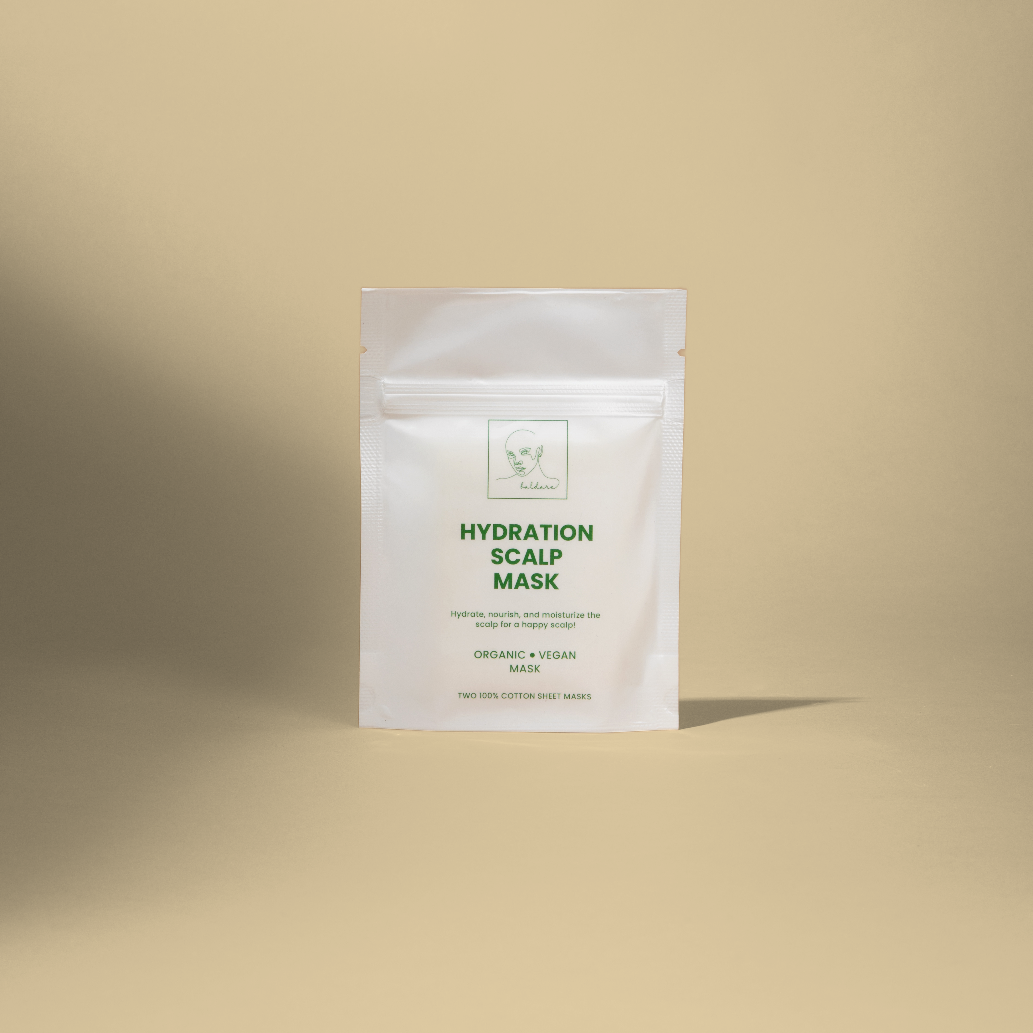 Hydration scalp mask package on a beige background